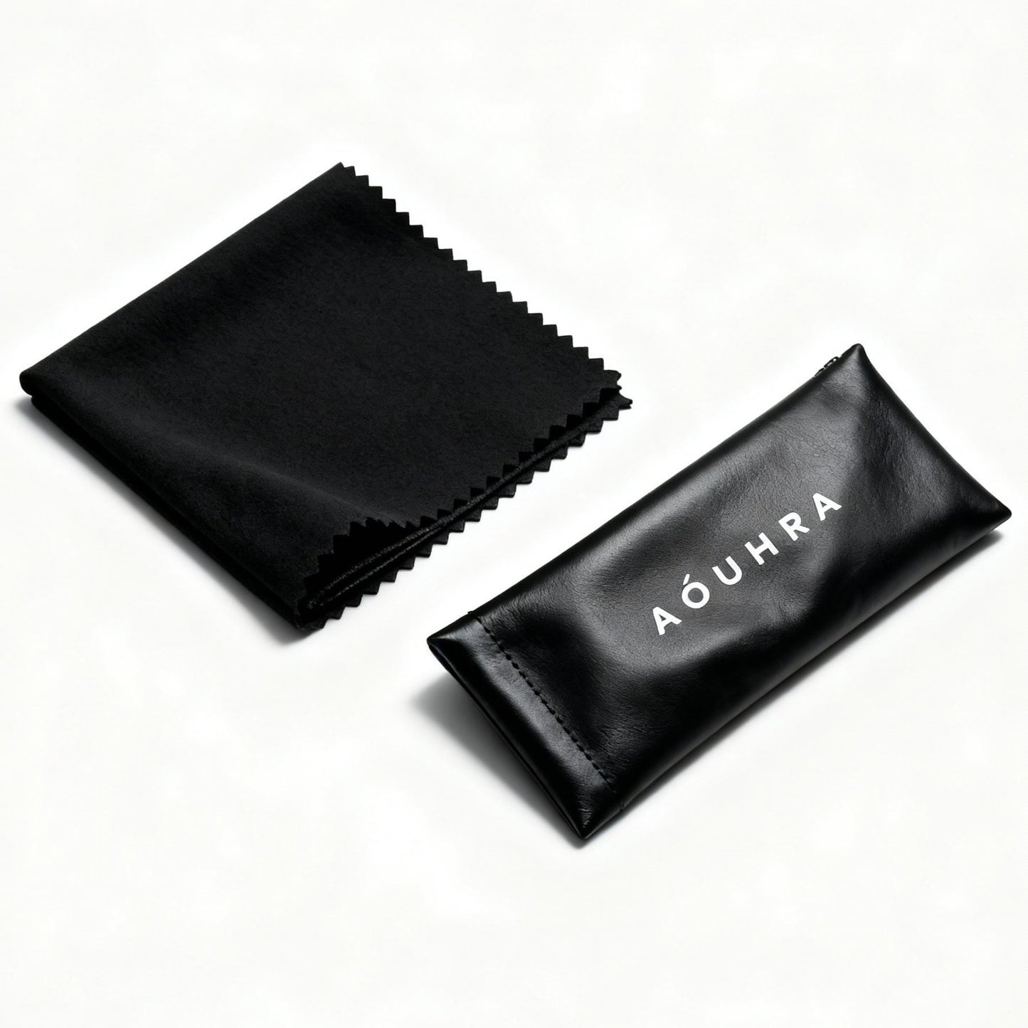 Black cleaning cloth and pouch with 'Aóuhra' branding on a white background