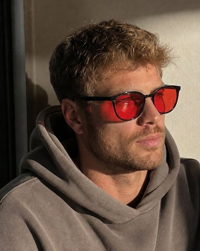 Red-lens glasses with a taupe hoodie